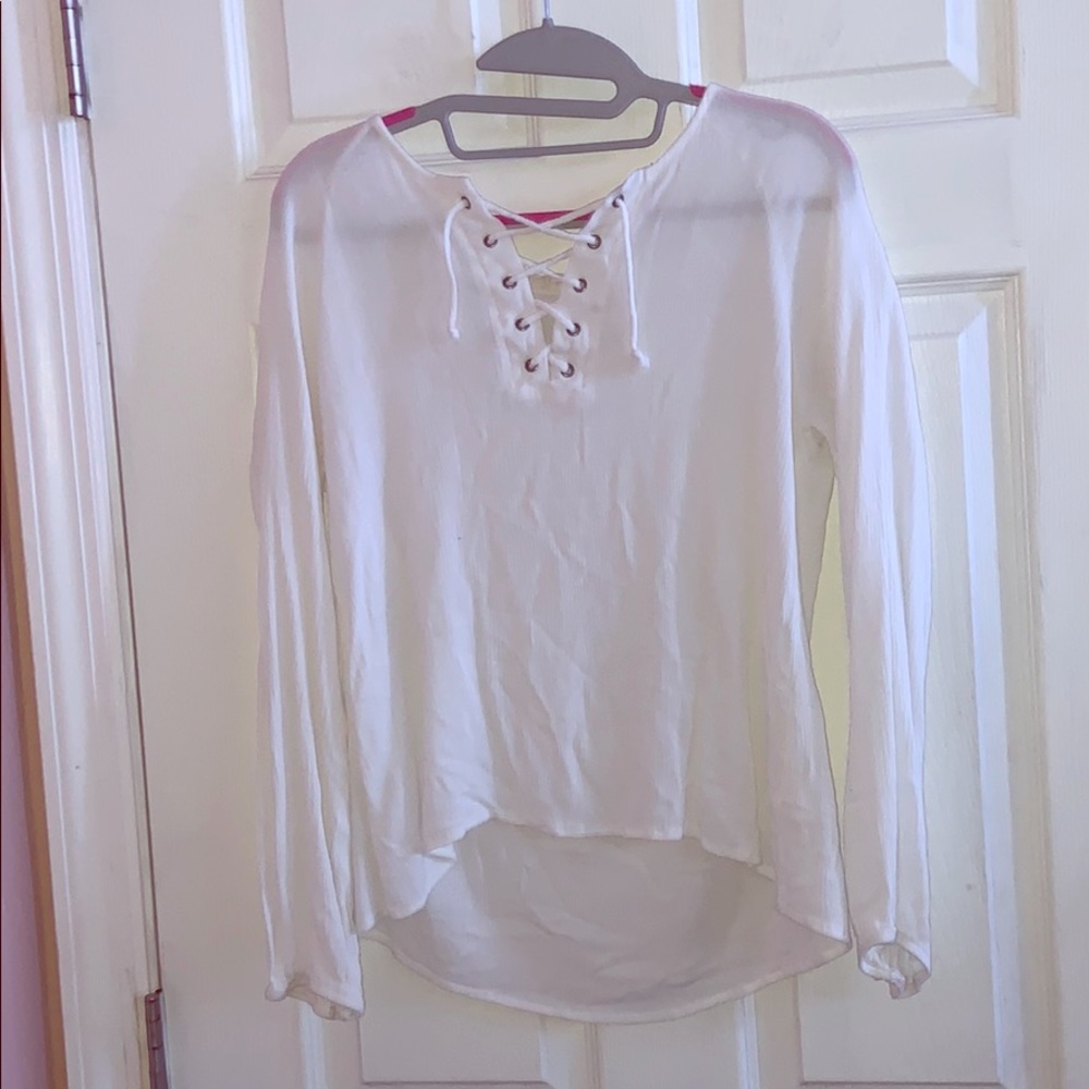 A white long sleeved blouse